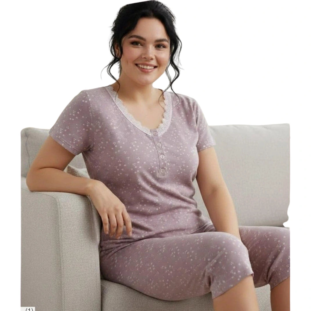 Plus size women's mauve short sleeve pyjama set with capri pants, available in sizes 2XL, 3XL, 4XL, and 5XL.