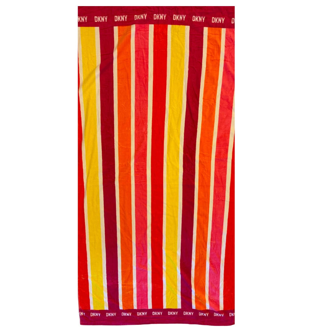 Striped beach towel with red, orange, and yellow stripes 